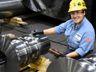 Scot Forge employee-owner scanning forgings