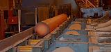 Hot steel baron a conveyer belt at Scot Forge, Clinton manufacturing plant.